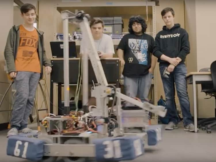 Arkansas students using robotics in a classroom