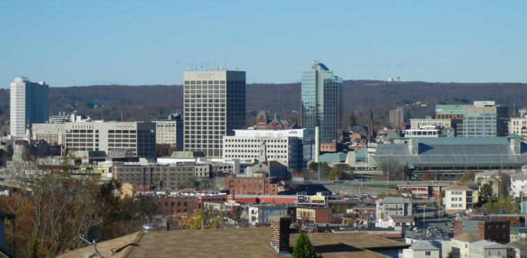 View of Downtown Worcester Massachusetts skyline with mountains in the background
