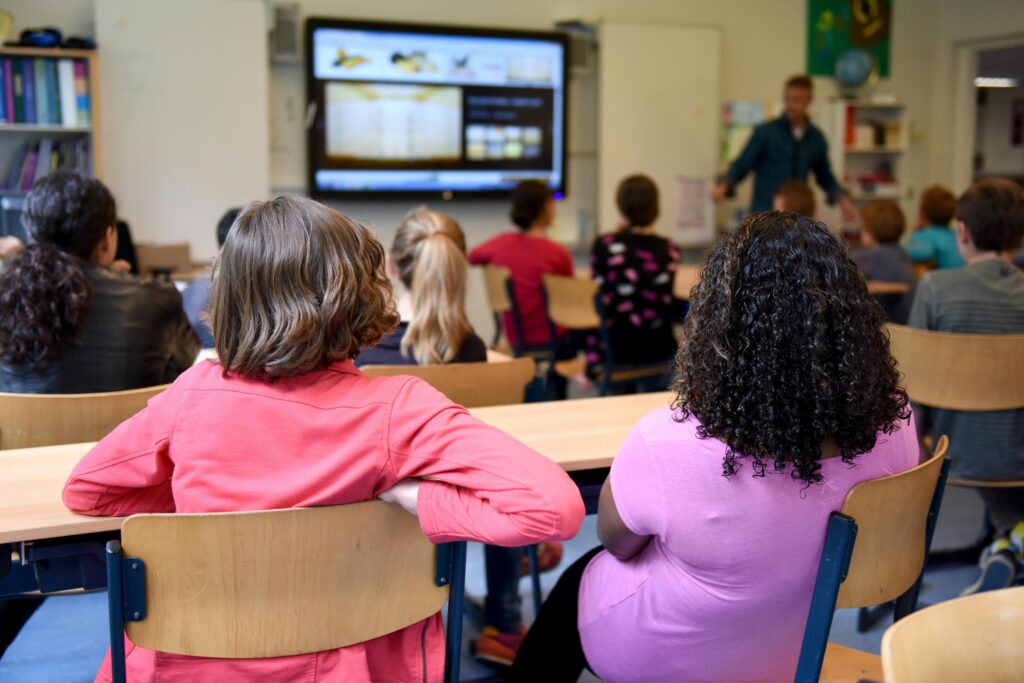 Classroom wit students looking at teacher